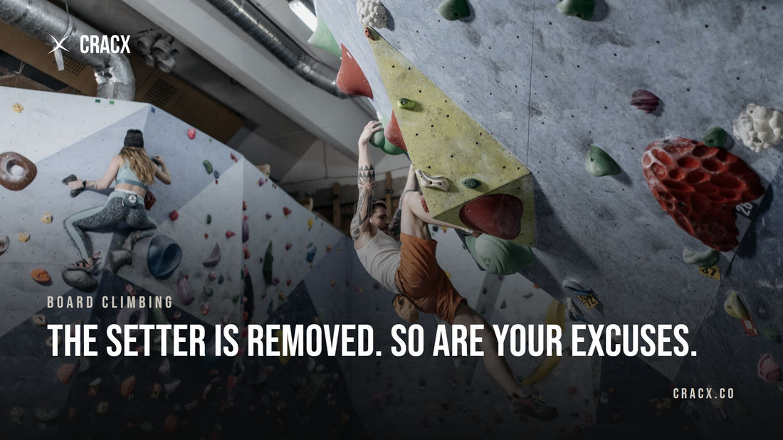 A climber pulling through a steep overhanging section in a bouldering gym