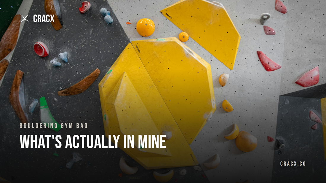 A bouldering gym wall covered in volumes and holds before a session