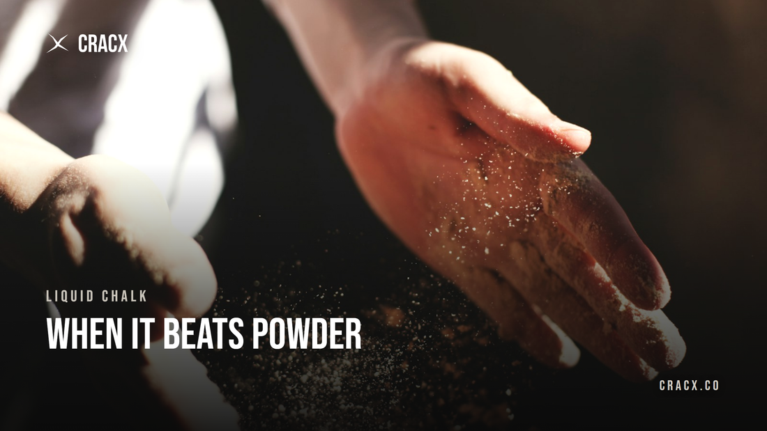 Chalk dust falling from a climber's hands after chalking up — the dust liquid chalk avoids