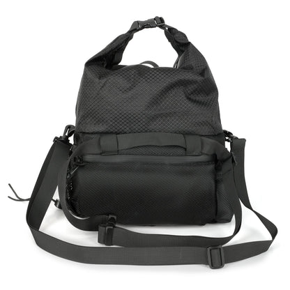 Back of the CRACX Ascend chalk bucket with the adjustable shoulder strap laid out for crossbody carry