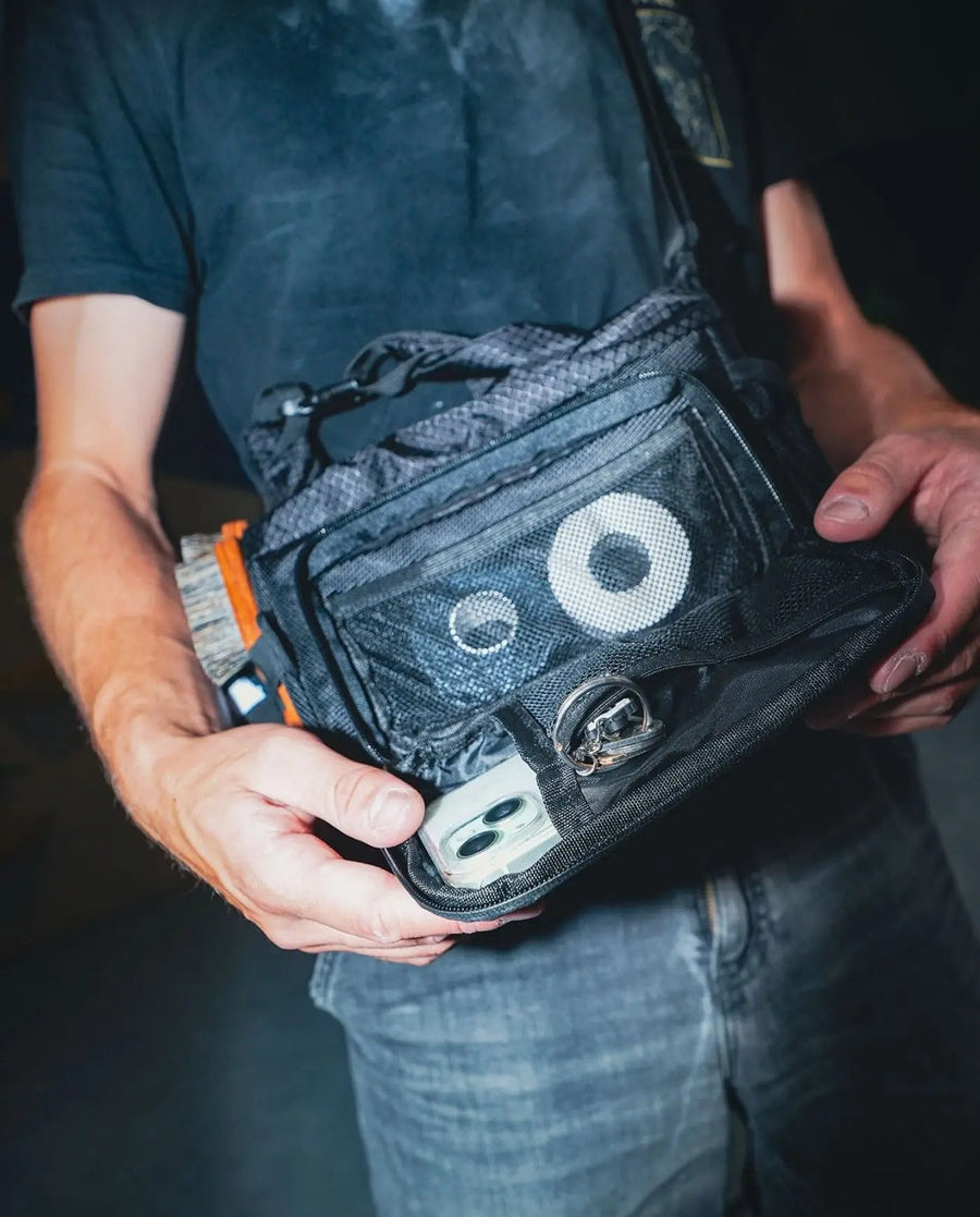 One bag for the whole session: the CRACX Ascend carried loaded with tape, phone, keys and a brush